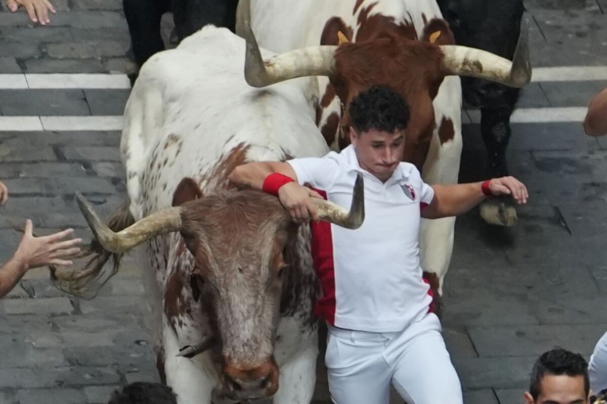 Cuarto encierro de los Sanfermines  / AINHOA TEJERINA